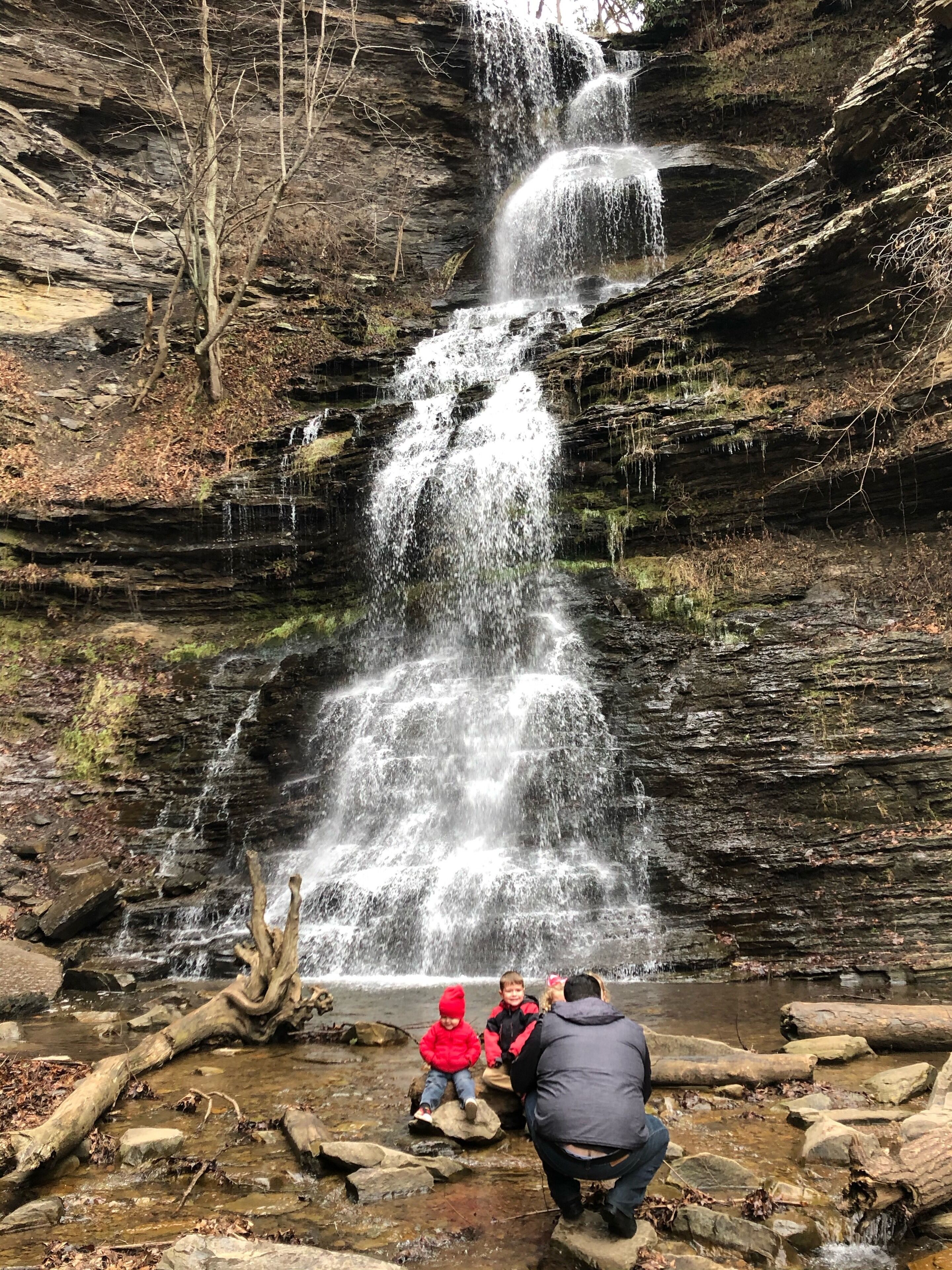 A waterfall cascading down a rocky cliff.