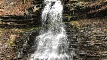 A waterfall cascading down a rocky cliff.