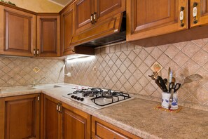 Fridge, stovetop, coffee/tea maker, toaster