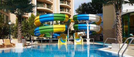 Indoor pool, seasonal outdoor pool, pool umbrellas, pool loungers