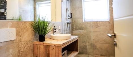 Shower, free toiletries, hair dryer, towels