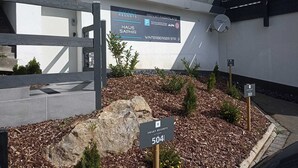 A sign for 'SMART RESORTS' at Winterberger Str. 3, indicating a private parking area.