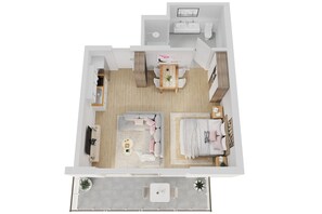 A 2-bedroom apartment layout with a living room, dining area, kitchen, and bathroom.