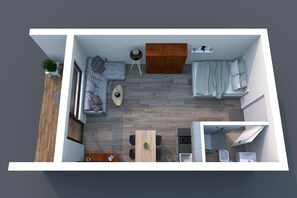 Un plan d’étage en 2D d’un appartement moderne comprenant un salon, une cuisine et une salle de bain.