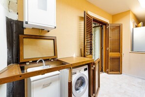 Interior - GuestHost - 45 sqm apartment just a few minutes from the Taormina's centre - in a quiet and residential area. Located on the second floor of a building with a lift (not suitable for disabled people), it comes with a private terrace overlooking the sea!Ou (Taormina)