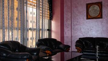 Superior Double Room | Living area | 32-inch TV with satellite channels