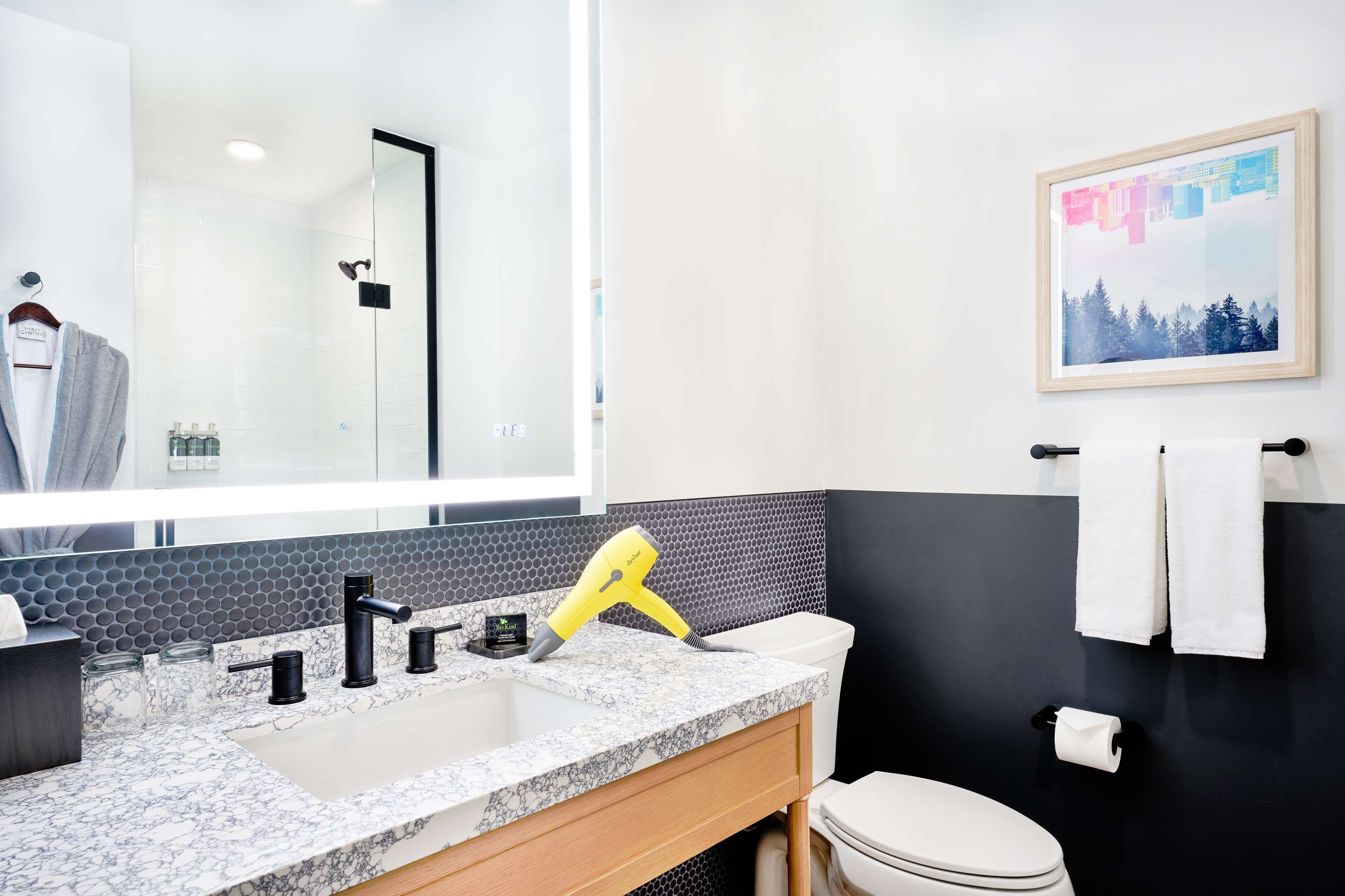 shower, hair dryer, bathrobes, towels