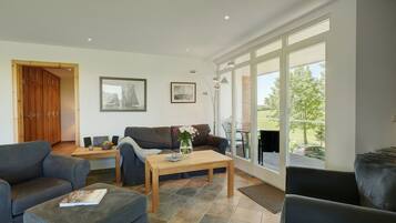 Condo | Living area | 50-inch flat-screen TV with satellite channels, TV, DVD player