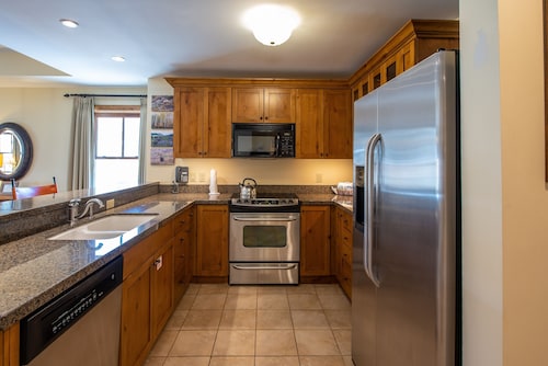 Two Bedroom Condo with Balcony over Mountaineer Square - Just Steps from the Slopes! 2 Condo - No Cleaning Fee! by RedAwning