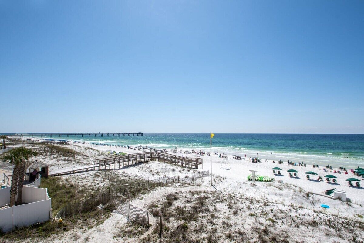 On the beach, sun loungers, beach towels