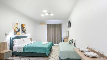 Standard Triple Studio | Wi-Fi de cortesia, roupa de cama