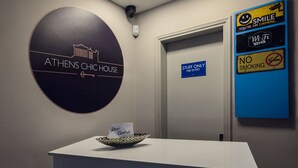 A reception area with a sign reading "ATHENS CHICHOUS" and a "STUFF ONLY NO ENTRY" sign. - Athens Chic House Apt A3 40sq.m (Athina)