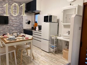 Fridge, microwave, stovetop, cookware/dishes/utensils