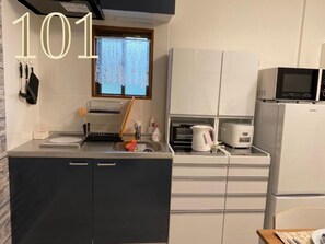 Fridge, microwave, stovetop, cookware/dishes/utensils