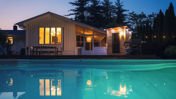 A house with a swimming pool, a covered patio, and a small adjacent building with a door and windows. - Rondout Retreat: Private Poolside Luxury with Hot Tub, Sauna and Fire Pit (Rosendale)