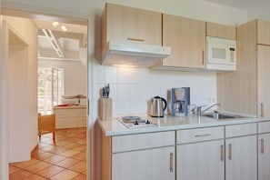 Condo | Private kitchen | Fridge, microwave, stovetop, electric kettle