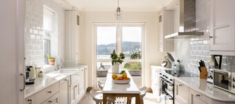 Beautifully appointed waterfront 4 bedroom house with private access to Woods