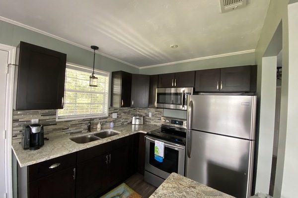 Frigorifero, microonde, forno, piano cottura