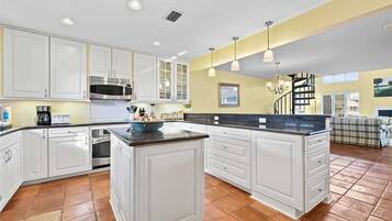 Condo, Multiple Beds, Patio | Private kitchen | Fridge, microwave, stovetop, dishwasher