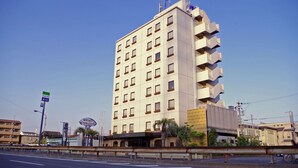 A tall, multi-story hotel with a modern design, featuring a flat roof and numerous windows. - City Hotel Seiunso (Sakai)