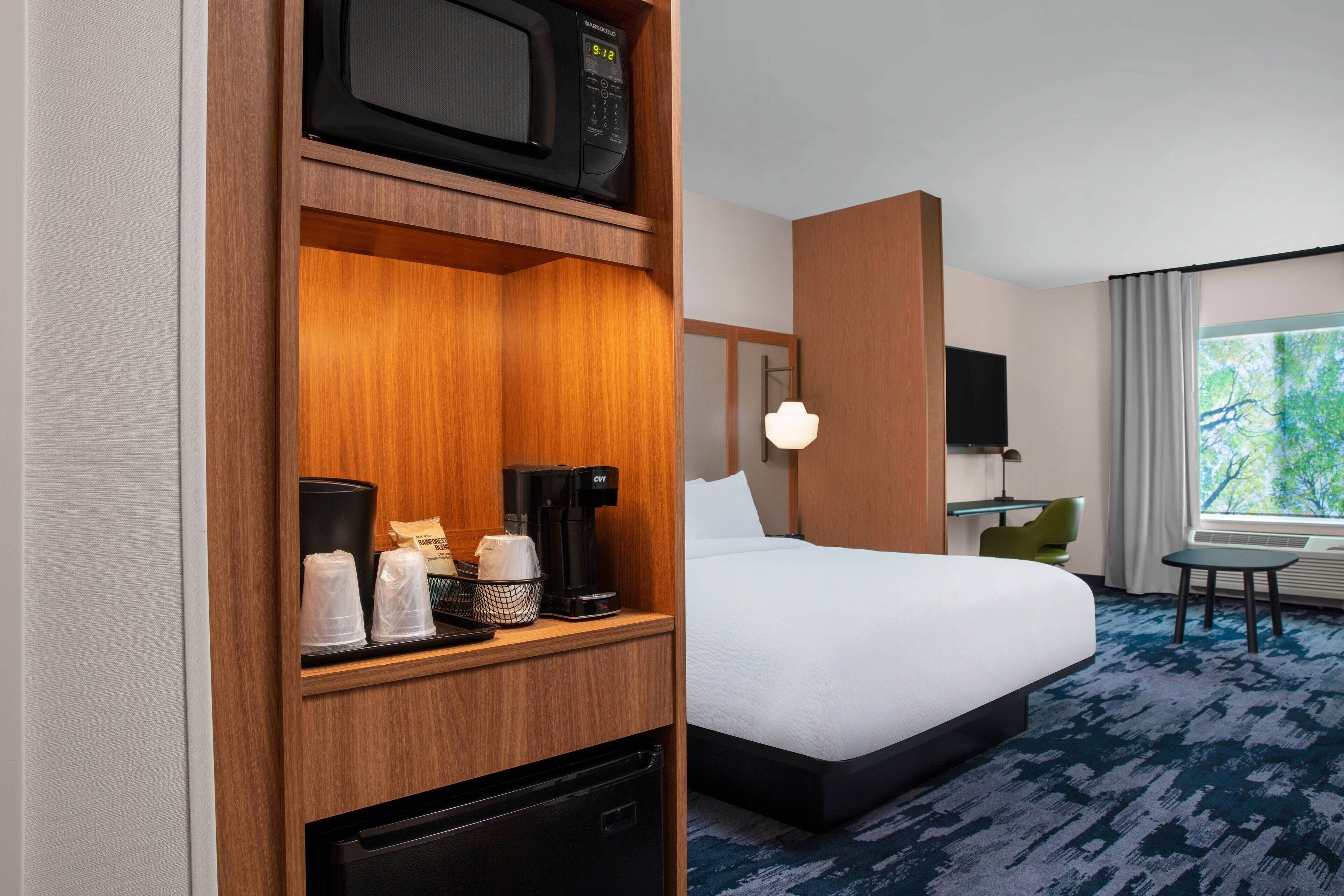 desk, laptop workspace, iron/ironing board, free cots/infant beds