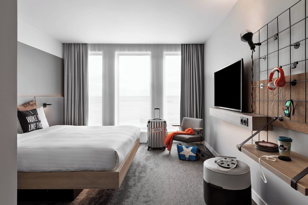 room, 1 queen bed (moxy) | desk, laptop workspace, blackout curtains, soundproofing