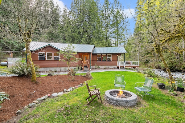 Front yard fire pit next to creak.