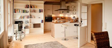 Condo | Living area | 50-inch flat-screen TV with satellite channels, TV, DVD player