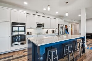 Fridge, microwave, oven, stovetop - Beach Villas A & B 6BR/4BA Oceanfront Condo in Cherry Grove (North Myrtle Beach)