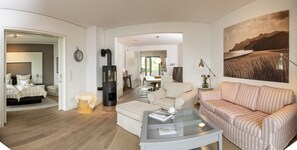 Condo | Living area | 50-inch flat-screen TV with cable channels, TV, fireplace