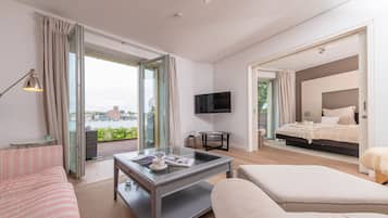 Condo | Living area | 50-inch flat-screen TV with cable channels, TV, fireplace