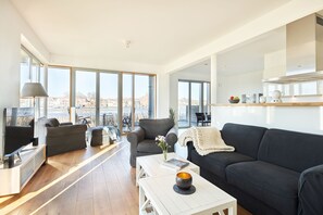Condo | Living area | 50-inch flat-screen TV with cable channels, TV, fireplace - Lotsenhaus 12 (Kappeln)