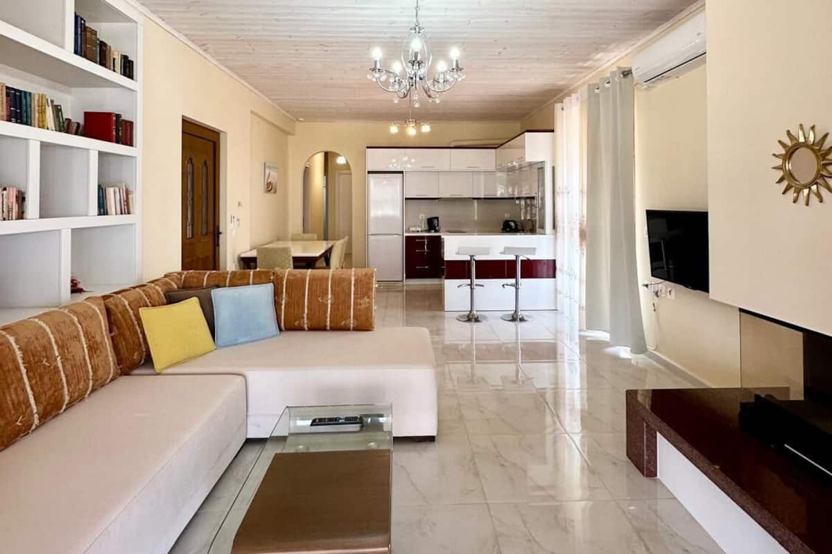 Apartment, 2 Bedrooms, Terrace, Sea View | Living area | 40-inch flat-screen TV with cable channels