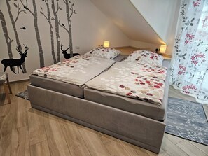 1 chambre, coffres-forts dans les chambres, fer et planche à repasser