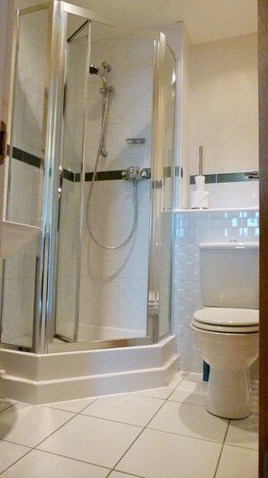 Bathtub, hair dryer, towels