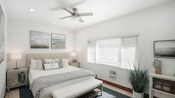 1 bedroom, desk, iron/ironing board, travel crib