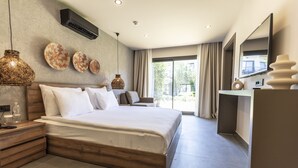 A modern hotel room with a large bed, bedside tables, a TV, and a large window with curtains. - Khai Hotel Bodrum (Bodrum)