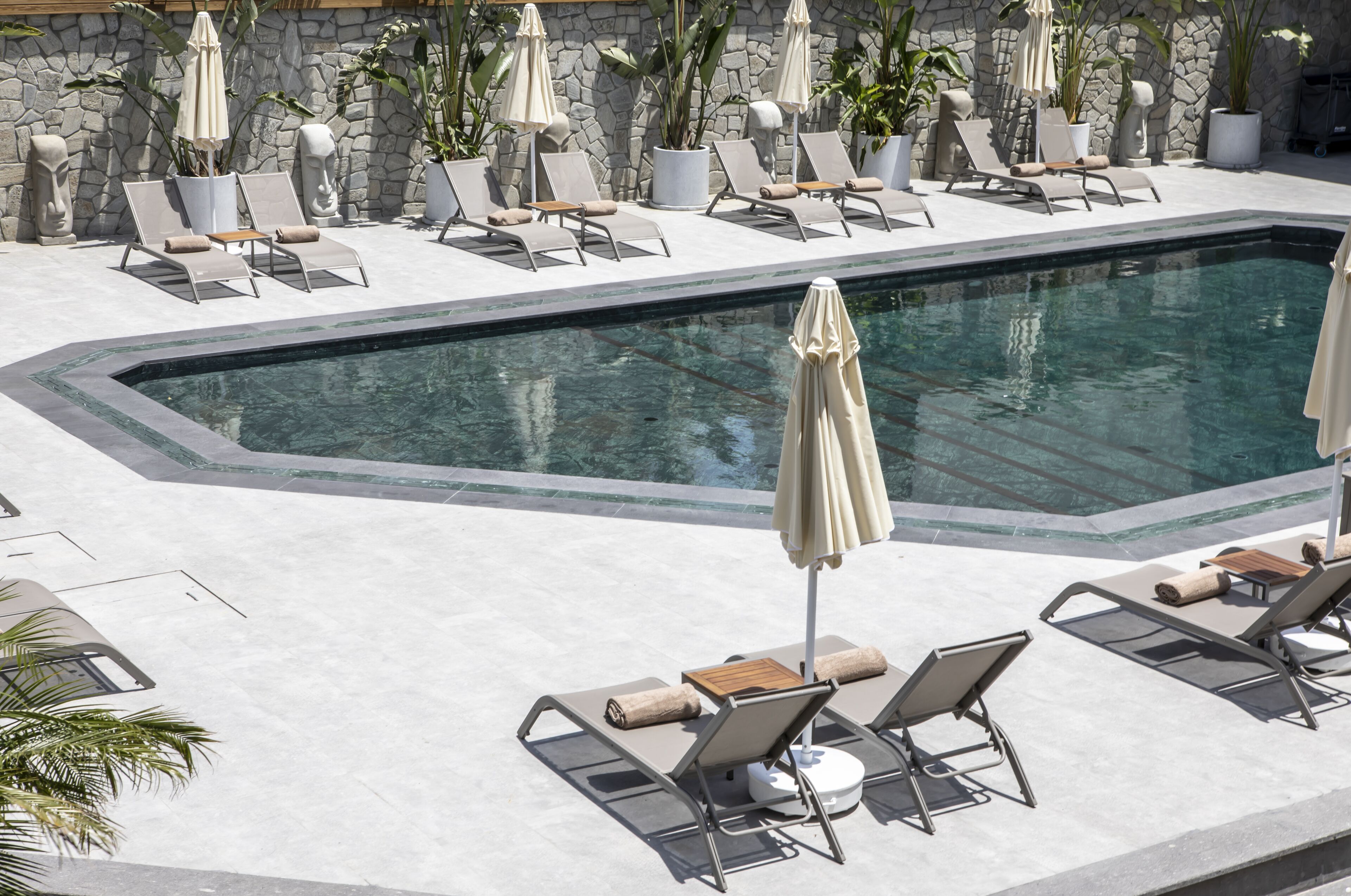 seasonal outdoor pool, open 8:00 am to 7:00 pm, free pool cabanas