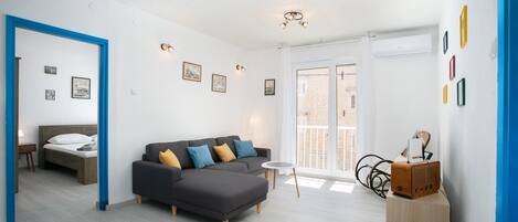 Familieleilighet | Oppholdsrom | En 32-tommers TV med Parabol-TV