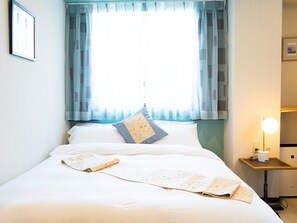 1 dormitorio, escritorio, wifi gratis y ropa de cama