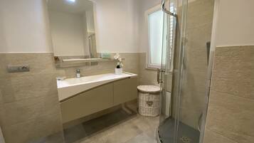 Shower, hair dryer, bidet, toilet paper