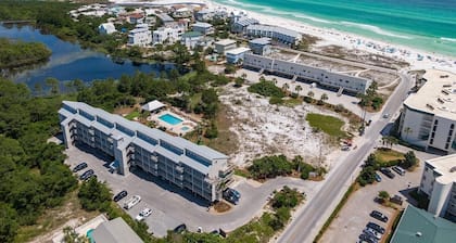 Gulf View - Steps away from beach entrance, heated pool and spa all year long.