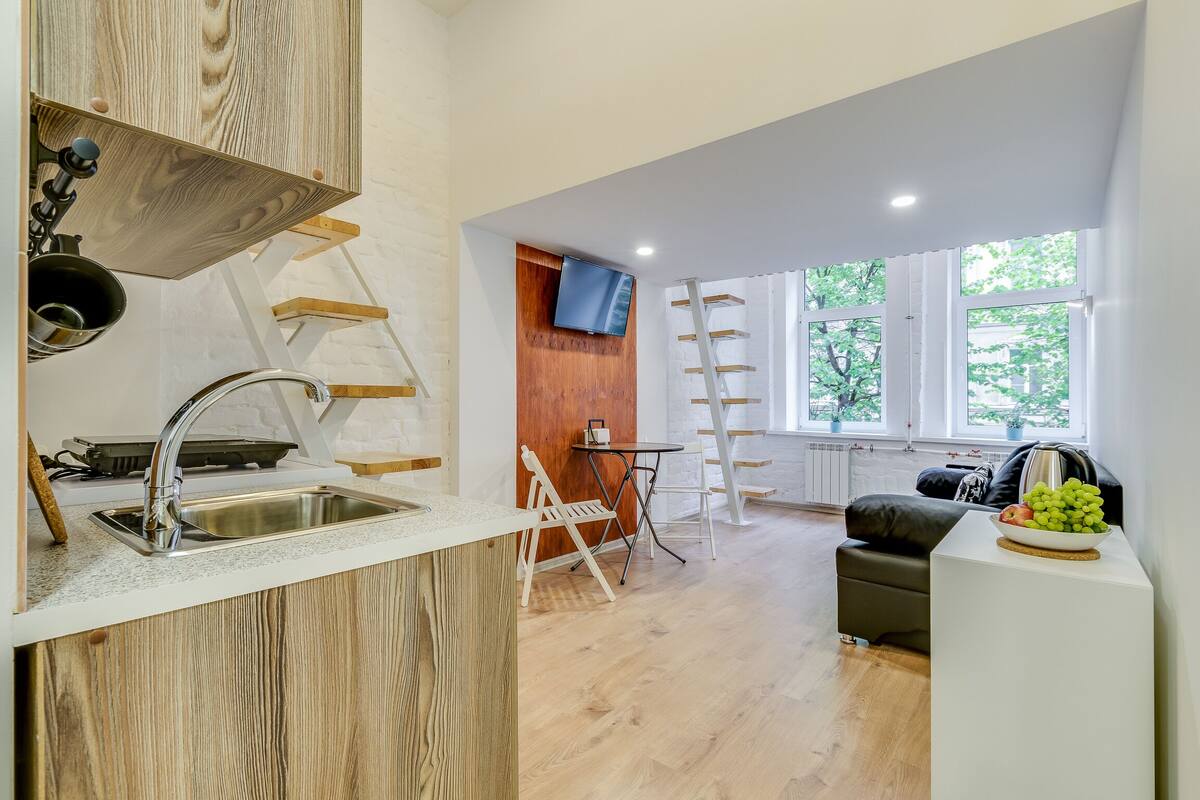 Luxe kamer | Woonruimte | Een flatscreentelevisie