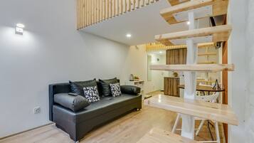 Luxury-Zimmer | Wohnbereich | Flachbildfernseher