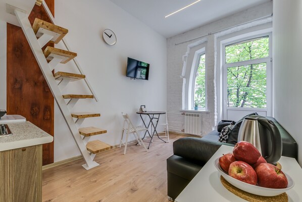 Superior-værelse | Opholdsområde | Fladskærms-tv