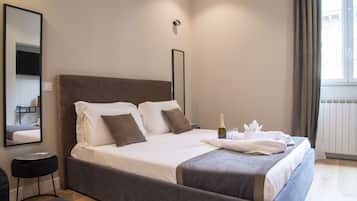 Rom – deluxe | Sengetøy av topp kvalitet, dundyner, memory foam-senger og minibar