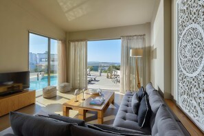 Elegance Villa Sea View with Individual Pool | Zona de estar | Televisión LED de 49 pulgadas con canales por satélite, una televisión