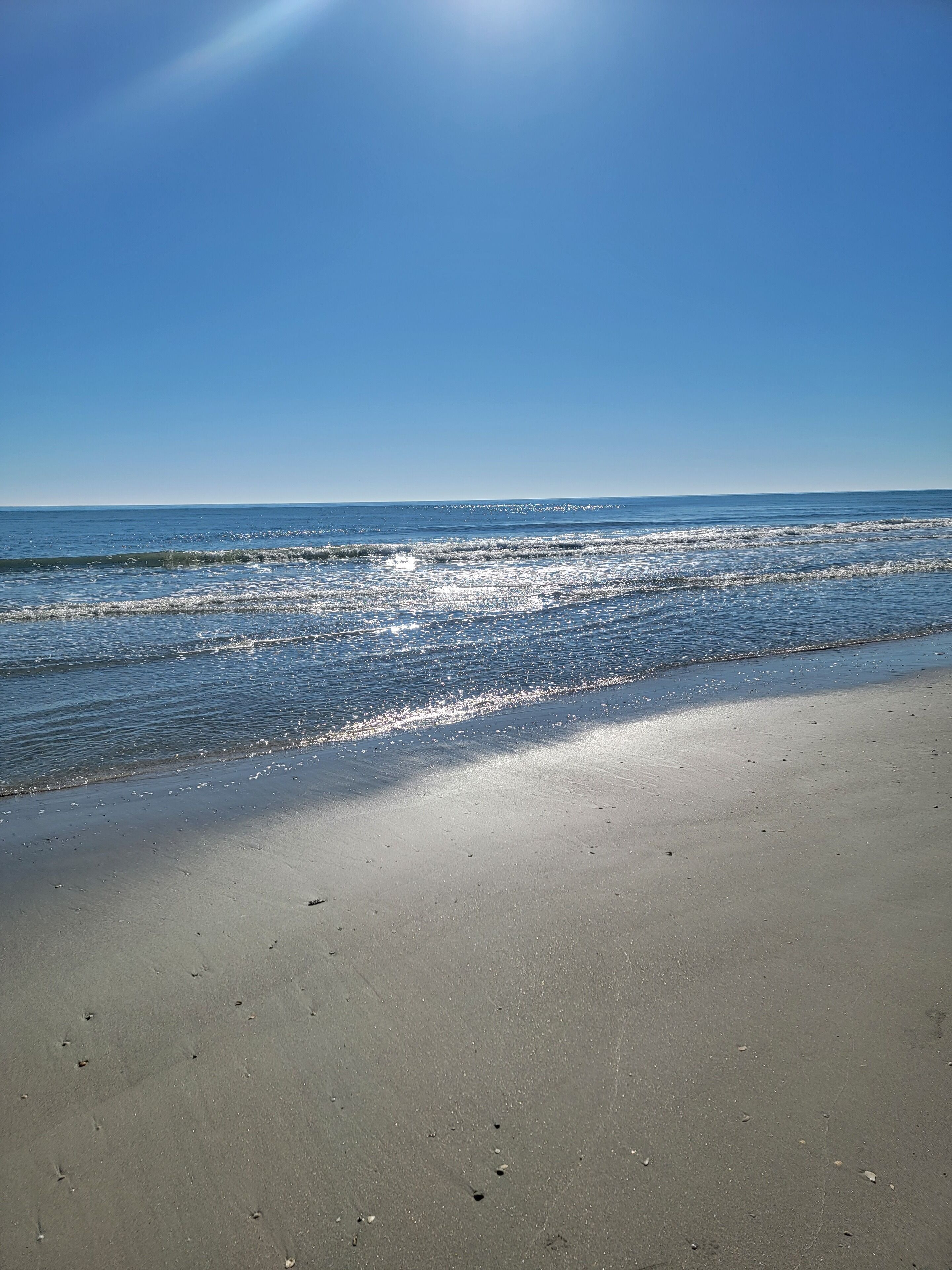 Beach nearby, sun loungers