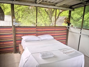 In-room safe, bed sheets - El Hamaquero Hostal EcoNativo (Rosario Islands)
