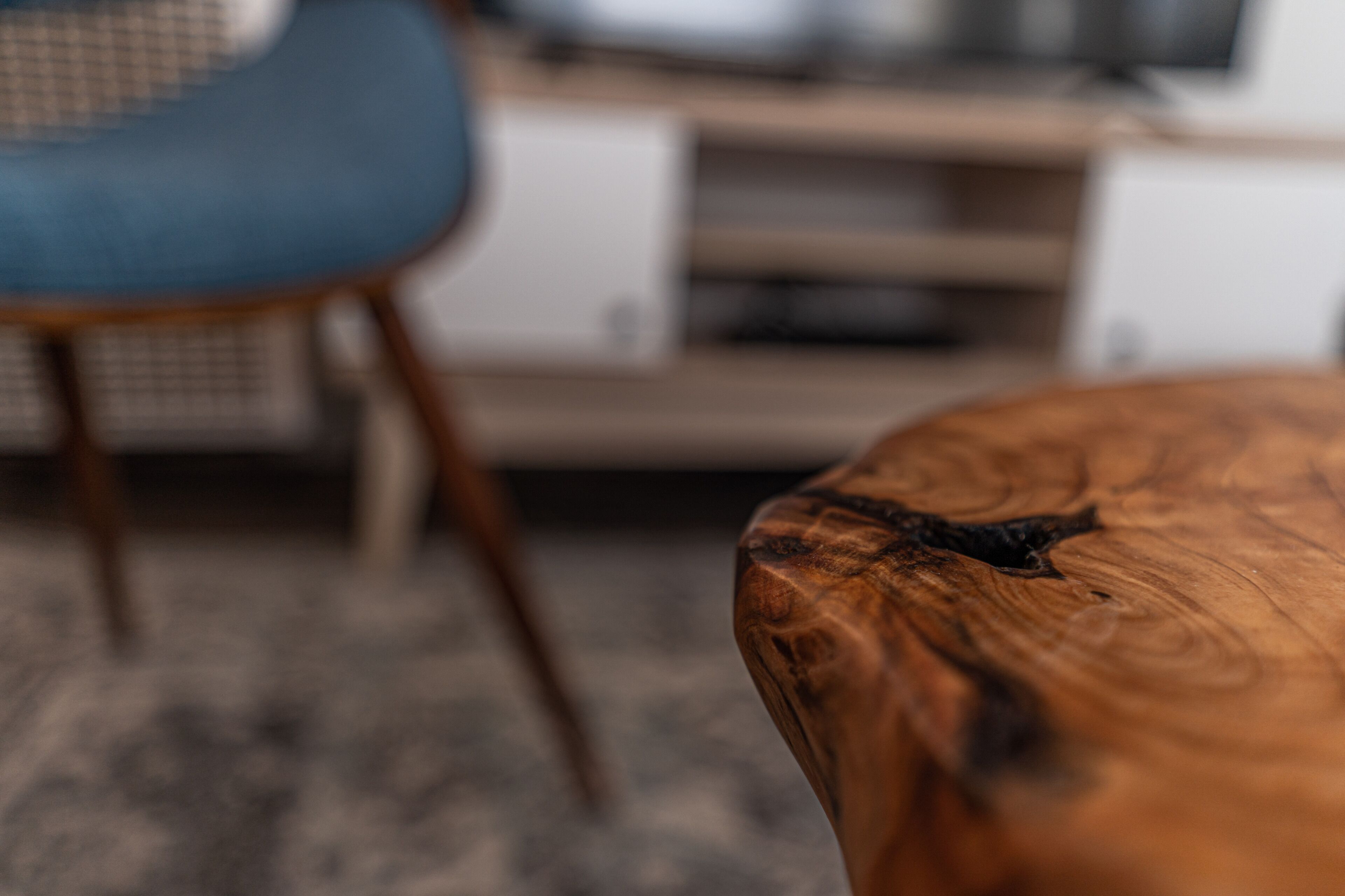 A close-up of a wooden table with a natural grain pattern.
